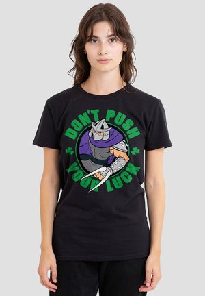 Black cotton t-shirt featuring a graphic design of a character with a gray helmet and armor, green text reading "DON'T PUSH YOUR LUCK."