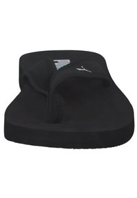 Flip-flop nera con una fascia testurizzata, suola liscia e un logo discreto sulla soletta. Presenta un design classico a infradito.