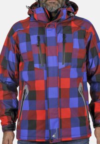 Veste à carreaux multicolores en rouge, bleu et noir. Équipée de poches zippées sur la poitrine et sur les côtés, d'une capuche ajustable et d'un tissu texturé.