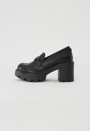 Plateaupumps - black