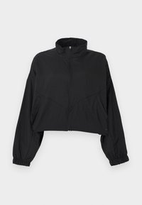 Μαύρο cropped σακάκι με ψηλό γιακά, φερμουάρ μπροστά, μακριά μανίκια, ελαστική μανσέτα και λοξά ραφές στο σώμα.