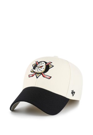 Casquette de baseball avec un devant crème, une visière noire et un logo brodé représentant un masque de gardien et des crosses de hockey croisées. Logo de la marque sur le côté.