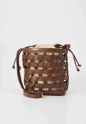 Woven brown leather bag with a light canvas interior. Features a drawstring closure and an adjustable strap for crossbody wear.