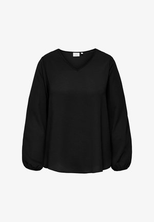 Haut noir à manches longues avec un col en V, présentant une coupe ample et des poignets froncés. Fabriqué en tissu texturé pour une dimension ajoutée.