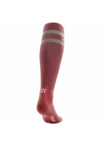 Calzino rosso al ginocchio con strisce orizzontali verdi, materiale a maglia testurizzato, tallone rinforzato e logo bianco sulla suola per una migliore aderenza.