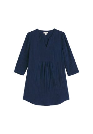 Tumesinine naiste tünik kolme neljandiku pikkuste varrukatega, V-kaelusega ja kerge kanga peal tekstuursete vertikaalsete voltidega.