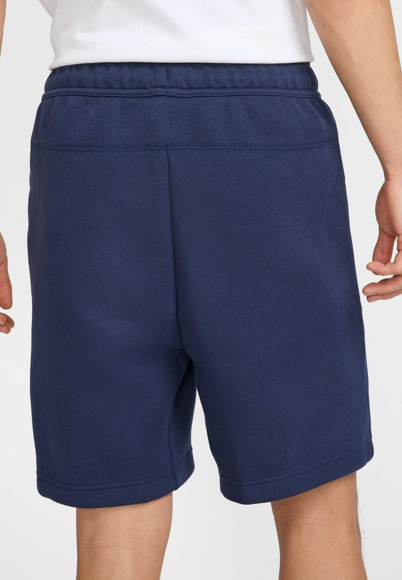 Nike Sportswear SPORTSWEAR TECH FLEECE - Teplákové kalhoty - obsidian black