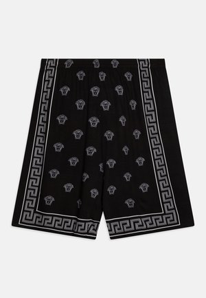 Zwarte shorts met een herhaald wit Grieks-Romeins patroon en kleine witte hoofdontwerpen. Elastische tailleband voor comfort.