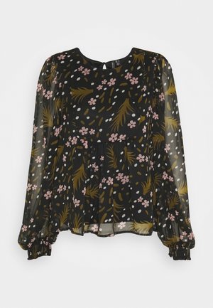 Blouse noire transparente à manches longues avec motifs floraux et feuilles roses et bruns, col rond et poignets froncés.
