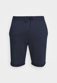 Marinblå shorts gjorda av mjukt tyg, med dragsko i midjan, sidofickor och upprullade ärmslut. Enkelt och funktionellt design.