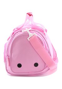 Pink bag made of durable material, featuring a rounded shape, adjustable strap, and two circular black accents on the base.