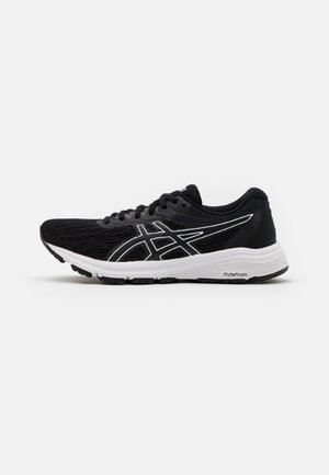 Chaussure de course noire avec semelle blanche et logo, empeigne en mesh légère et amorti FlyteFoam visible sur le côté.