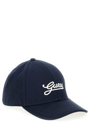 Navy blue baseball cap made of fabric with a curved bill, featuring white embroidered "Guess" logo on the front.