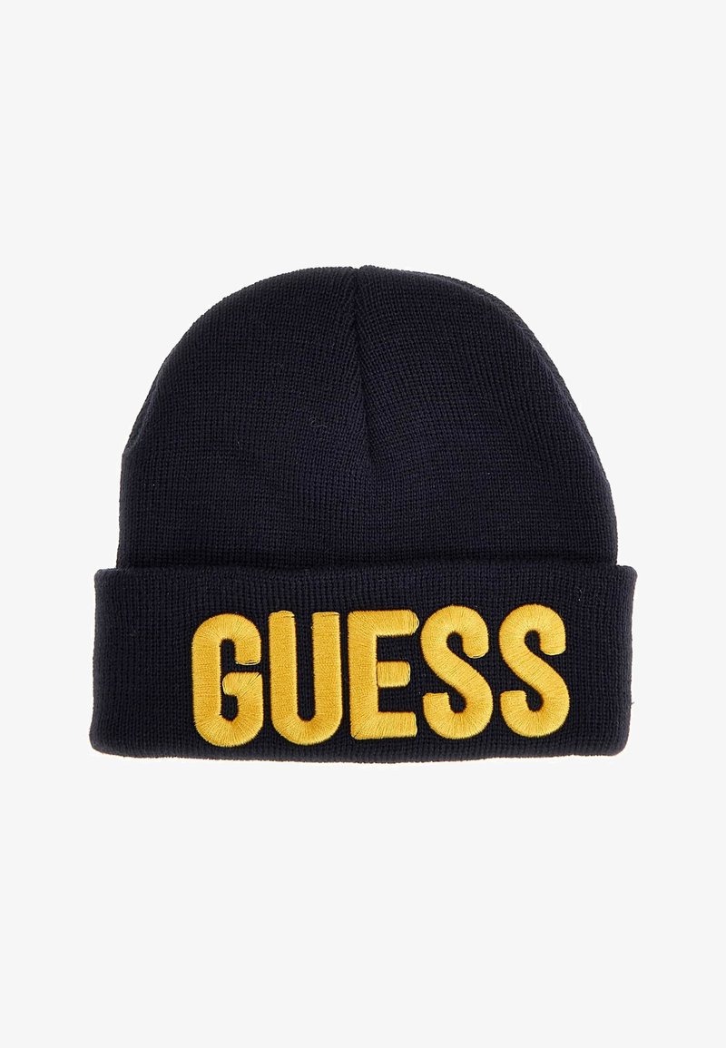 Granatowa dzianinowa czapka z podwiniętym mankietem, z wyrazistym, żółtym haftowanym napisem "GUESS". Gładka tekstura, prosty design i dopasowaneos.