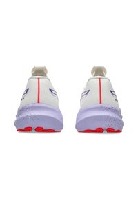 Pair of white running shoes with purple speckled midsoles, red outsole grips, and a vertical red stripe on the heel tab.