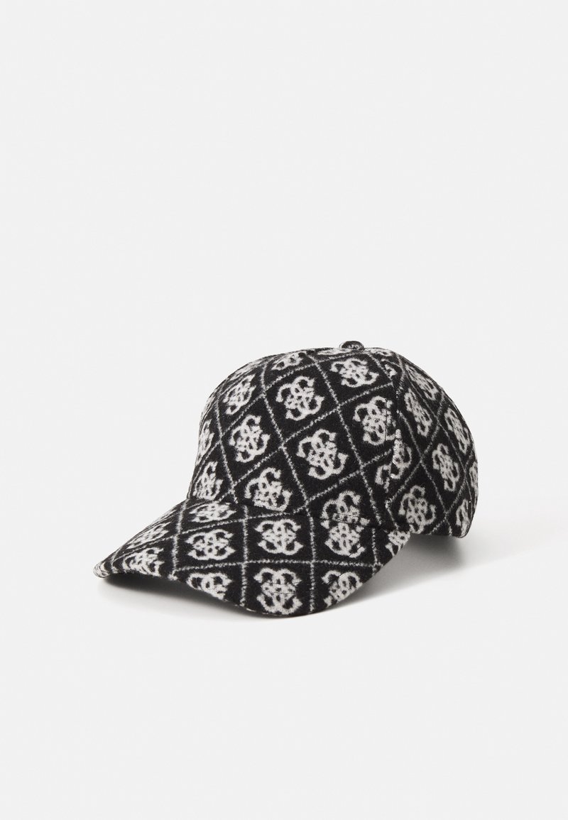 Casquette de baseball avec un motif en losange tissé noir et blanc, présentant des motifs floraux stylisés répétés sur le tissu.