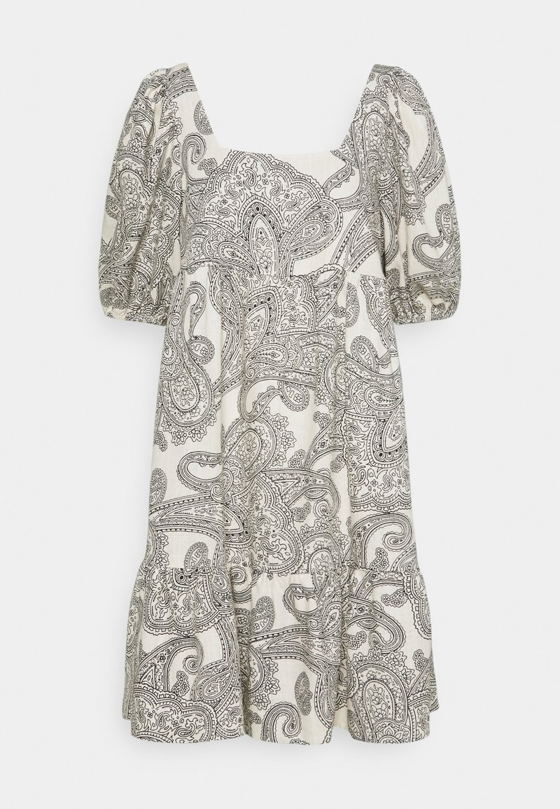 Kevyt mekko kermansävyinen mustalla paisley-kuviolla. Ominaisuuksiin kuuluvat puffihihat, neliönmuotoinen pääntie ja kerroksittainen hame.