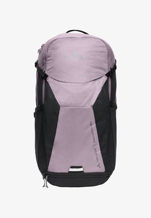 Mochila de senderismo morada clara y negra con múltiples compartimentos con cremallera y correas laterales ajustables, etiquetada como "Vaude Trail Control 25+".