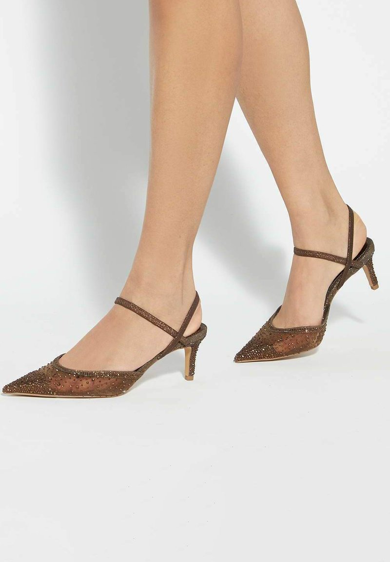 Brown satin slingback heels with pointed toes, embellished with small beads, and a modest contoured heel. Straps offer added support.