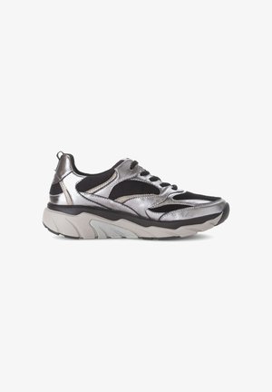 Black and silver athletic shoes featuring a mesh upper, metallic accents, and a thick, textured sole with a contrasting grey and black design.