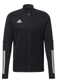 Zwarte sportjack met hoge kraag, volledige ritssluiting en textuur op het lichaam. Heeft witte drie-strepen accenten op de mouwen en een Adidas-logo op de borst.