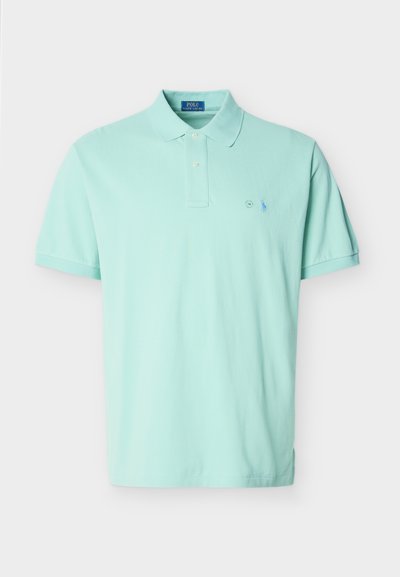 Ανοιχτό μπλε κοντομάνικο πουκάμισο Polo Ralph Lauren με γιακά, πατιλέτα με δύο κουμπιά και μικρό κεντητό λογότυπο στο αριστερό στήθος.