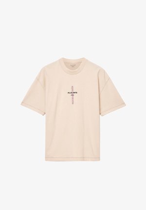 Beige cotton T-shirt with short sleeves, round neck, and front logo detail. Features a relaxed fit and visible stitching accents.