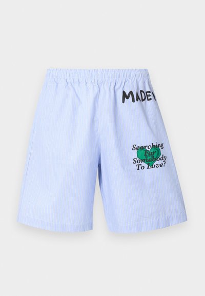 Blue striped shorts with an elastic waistband. Features "MADE IN" printed in black and a graphic text with a green heart.