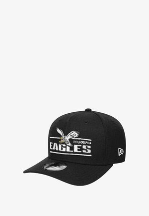 Black cap with a curved brim featuring embroidered Philadelphia Eagles logo and eagle design on the front. Made of textured fabric.