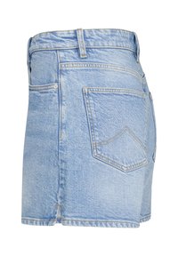 Light blue denim skirt with a high waist, featuring two back pockets and stitched detailing. The fabric is slightly worn with a smooth texture.