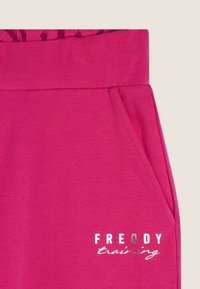 Freddy REGULAR FIT CON DRITTO CON PICCOLI SPACCHI - Pantalon de survêtement - beetroot purple