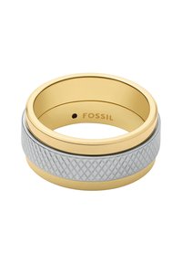 Bague en or et argent avec un anneau en argent texturé doté d'un motif en diamant, accentué par un anneau intérieur en or lisse. Nom de la marque "FOSSIL" visible à l'intérieur.