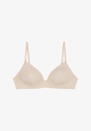 Beige langaton rintaliivi, jossa on pehmeä kangas, syvään uurrettu kupit ja säädettävät ohuet hihnat. Silkkinen pinta ilman koristeita.