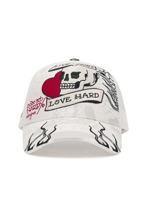 White cap with black flame designs, a skull graphic over a red heart, and text reading "LOVE HARD" and "DON ED HARDY designs."