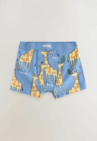 Pantaloni boxe per bambini in cotone blu, con vivaci giraffe gialle e macchie arancioni. Dotati di una cintura elastica e di un motivo giocoso.