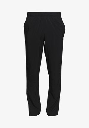 Pantalon de sport noir avec une taille élastique, des jambes droites et des poches latérales. Confectionné en tissu léger et lisse avec un détail logo.