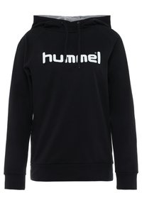 Svart hoodie med en framficka i känguru-stil, dragsnöre i huvan och vit "hummel" logotyp tryckt över bröstet. Mjuk tyg med strukturerad finish.
