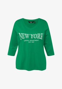 Maglia Dal Taglio Lungo E Svasato Con Design Batik, Scollo A V E Maniche A 3 4 Maglia Dal Taglio Lungo E Svasato Con Design Batik, Scollo A V E Maniche A 3 4