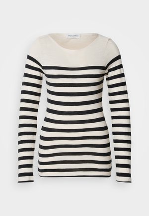 Striped long-sleeve top in beige and black. Features a rounded neckline and horizontal stripes of varying widths. Soft fabric texture.