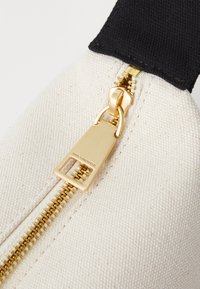 KARL LAGERFELD POUCH - Alkalmi kézitáska - natural