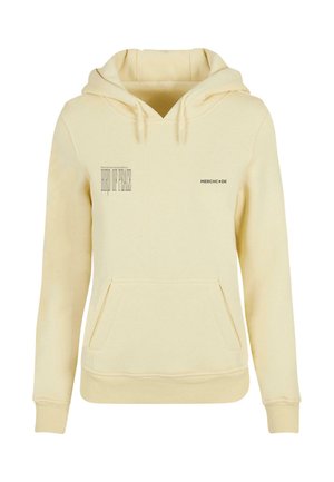Sudadera color crema con bolsillo canguro, capucha con cordón y texto impreso en el frente. Tejido suave y texturado con puños acanalados.