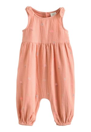 Detský overal bez rukávov broskyňovej farby s mašličkami na ramenách, stiahnutý v páse a pri členkoch, s jemnými malými potlačami.