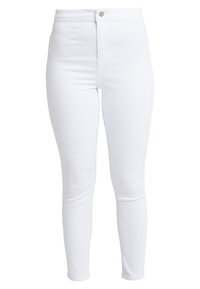 Bílé úzké džíny s vysokým pasem, vyrobené z elastického denimového materiálu. Mají přední zapínání na knoflík a hladký, jemný povrch po celé délce.