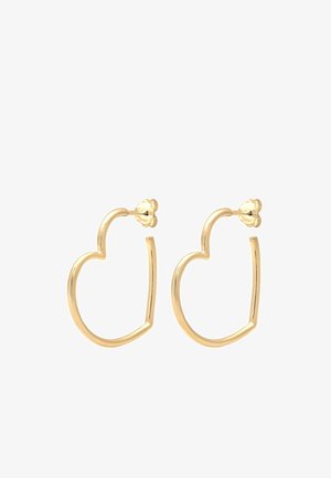 Paire de petites boucles d'oreilles créoles en or en forme de cœur avec des fermoirs papillon sur fond blanc.