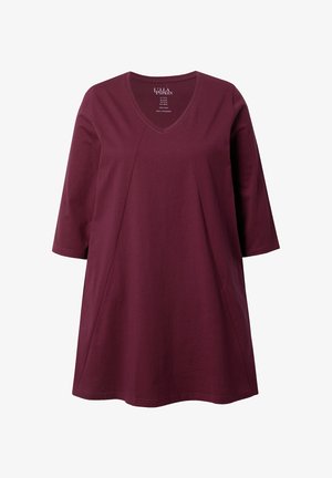 Burgunderfarbene Baumwolltunika mit V-Ausschnitt und Dreiviertelärmeln. Verfügt über einen lockeren Schnitt, Seitennähte und dezente Panelelemente.