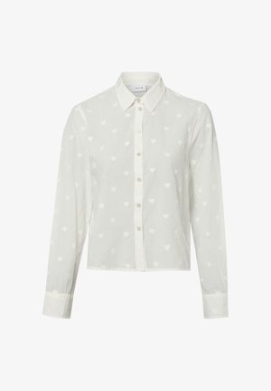 Weißes langärmliges Hemd mit Knöpfen und Kragen, das mit kleinen aufgestickten Herzmustern über den gesamten Stoff verziert ist.