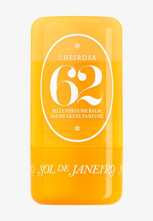 Récipient jaune en forme de bâton du baume parfumé en gel Sol de Janeiro Cheirosa 62 avec texte blanc et bordure ovale décorative à l'avant.