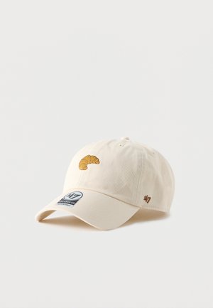 Gorra de algodón beige claro con visera curvada. Presenta un motivo bordado de croissant en el frente y un pequeño logo en el lateral.
