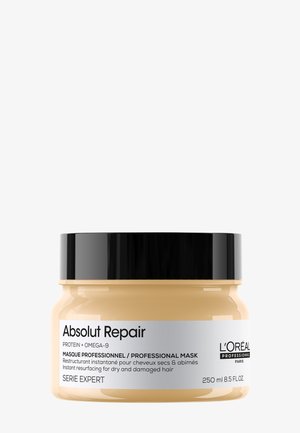 L'Oréal Professionnel Absolut Repair -hiusnaamio 250 ml pyöreässä, beigehtävässä purkissa, jossa musta kansi ja hopeinen etiketti.