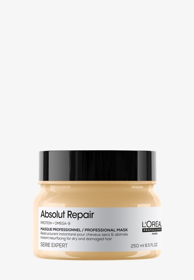 L'Oréal Professionnel Absolut Repair hårmaske i en rund, beige beholder på 250 ml med svart lokk og sølvfarget etikett.